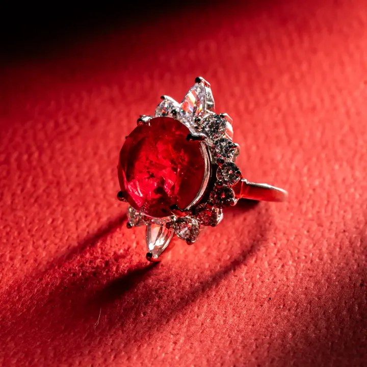 Ruby cocktail ring on red