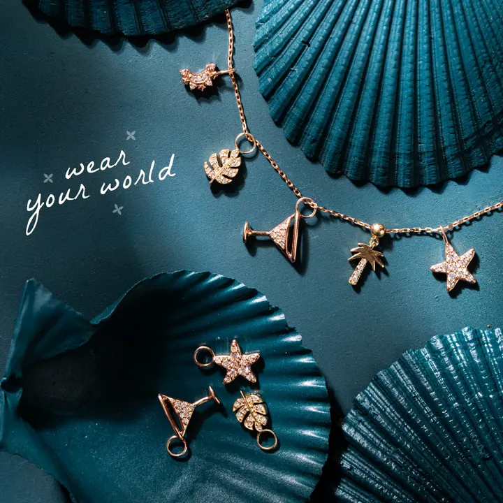 “Wear your world” charm necklace campaign